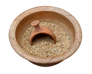 Rolgordijnen Clay pot with grains © alexsol