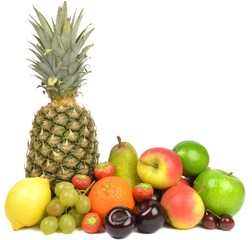 A selection of fresh fruit on white background with copy space