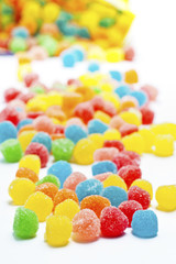 colored jellybeans covered granulated sugar