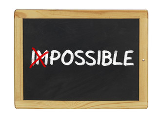Obraz premium Impossible geschrieben auf einer Schiefertafel