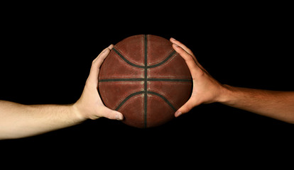 Two hands holding basketball - 47478425