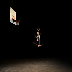 Nighttime basketball player