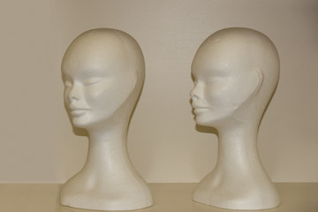 two female pollystyrene heads
