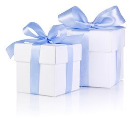 Two White boxs tied with a Blue satin ribbon bow Isolated on whi