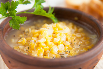 Soup of yellow peas close up