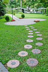 Beautiful block walkway in the green garden