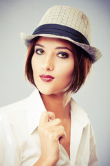 Beautiful stylish woman in hat
