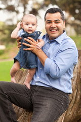Naklejka na ściany i meble Handsome Hispanic Father and Son Posing for A Portrait
