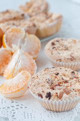 homemade muffins with nuts and mandarins