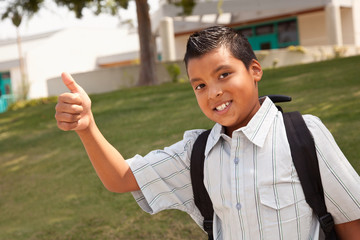 Happy Young Hispanic School Boy with Thumbs Up