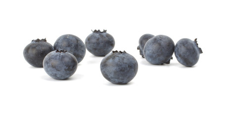 Blueberries closeup on white background.