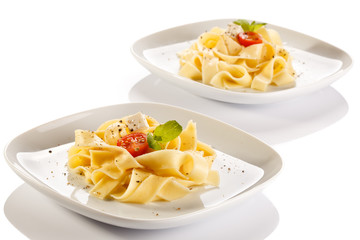 Pasta with tomatoes and white cheese