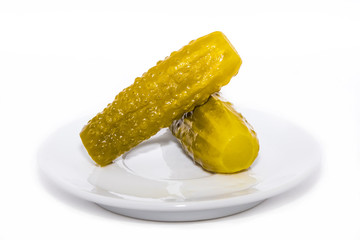 Pickles on white dish