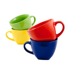 Set of colorful cups isolated on white