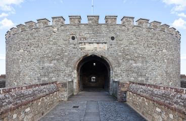 Entrance to medieval circular citadel tower with battlements