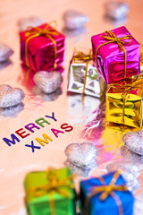 Christmas presents and Merry Xmas writing