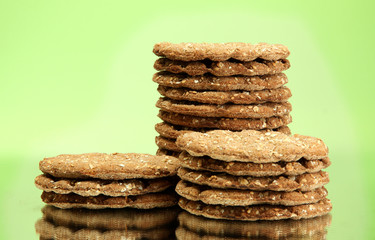 tasty crispbread, on green background