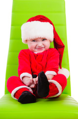 kid in Santa Claus clothes