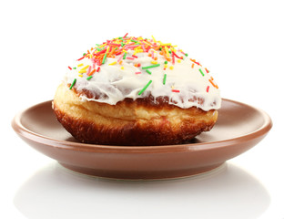 Tasty donut on color plate isolated on white