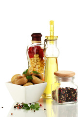 Delicious marinated mushrooms in bowl with spices isolated