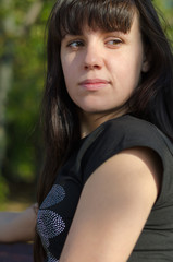 Closeup portrait of a pensive young woman