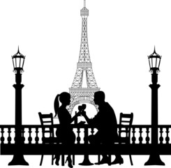 Romantic couple in front of Eiffel tower in Paris have a dinner