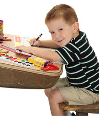 Boy at School Practicing Letter Writing