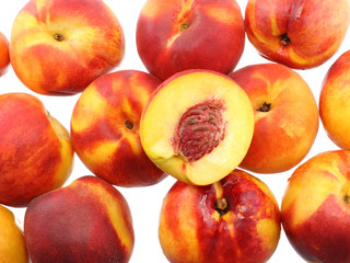 A heap of peaches, on white. Isolated