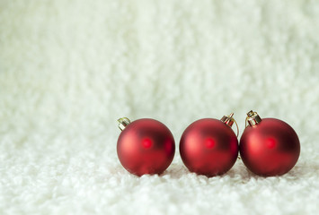 Christmas red balls on the white background