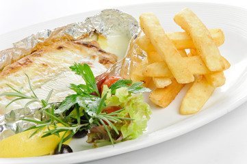 French fries and fish in foil