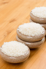 Fototapeta na wymiar White rice in bowl on table