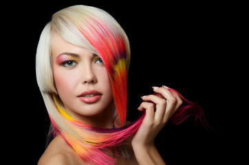 girl with a bright make-up and multi-coloured strand in hair