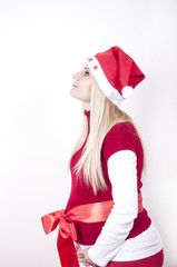 Panic pregnant woman with christmas hat