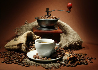 cup of coffee, grinder, turk and coffee beans