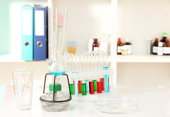 Different laboratory glassware with color liquid