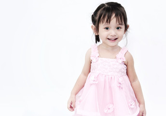 Little girl in pink smiling