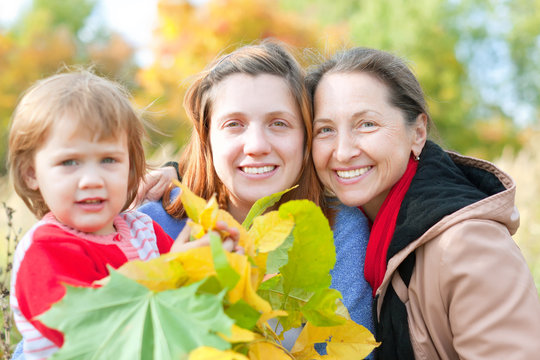  three generations women in  autumn