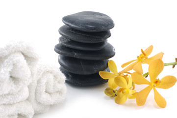 spa concept with yellow orchid and stones