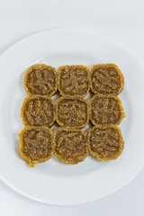 Traditional Thai dessert called  Kao Tu  on white plate