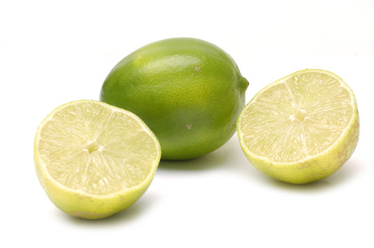 Lime and Sliced Lime Half on White background