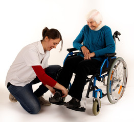 Fototapeta premium 241112 Hilfe im Rollstuhl
