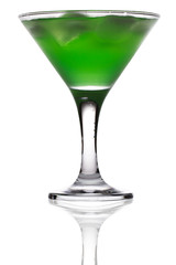 green martini cocktail into glass on white background
