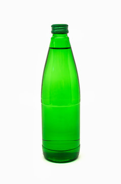 green glass bottle with mineral water
