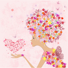 Modeblumenmädchen mit einem Herz aus Schmetterlingen
