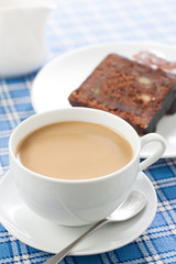 Delicious breakfast with coffee and chocolate cake