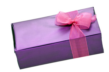 Purple gift box of chocolates with pink ribbon on white