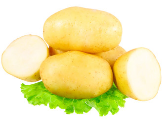 Young potatoes, decorating of lettuce . Isolated