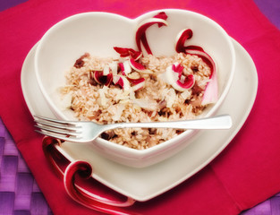 red chicory risotto in a heart shape plate