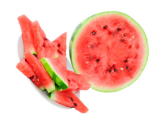 Half of watermelon with juicy slice, isolated.