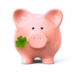 Piggy bank with four leaf clover